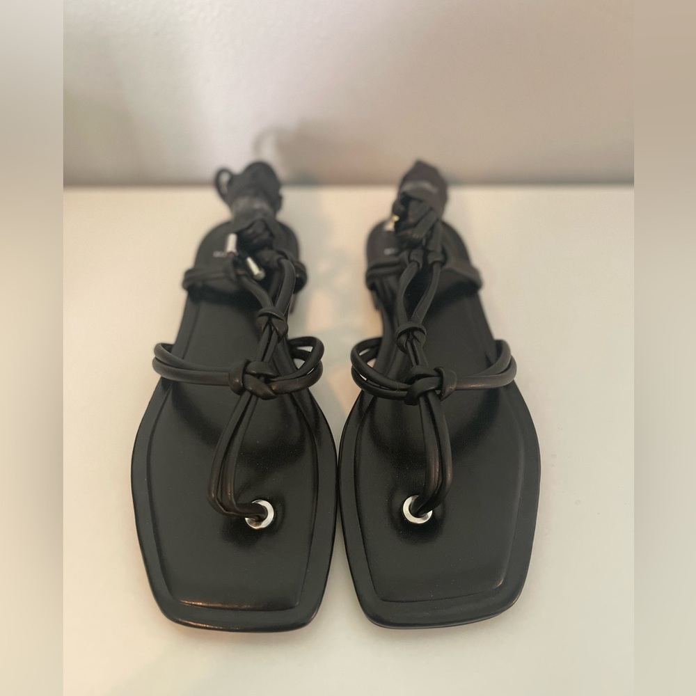Brand new, never worn, beautiful ankle lace up Marc Fisher sandals. Size 5.